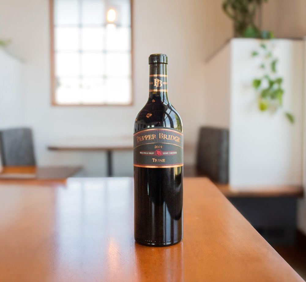 2021 Pepper Bridge Winery Trine Bordeaux-style red wine bottle from Walla Walla Valley, Washington.
