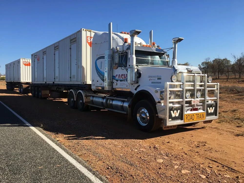 A Semi Truck Is Parked On The Side Of The Road — Go Pack Yourself in Braitling, NT