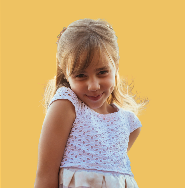 Young shy girl with blonde hair smiling
