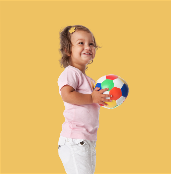 Young toddler playing with toys