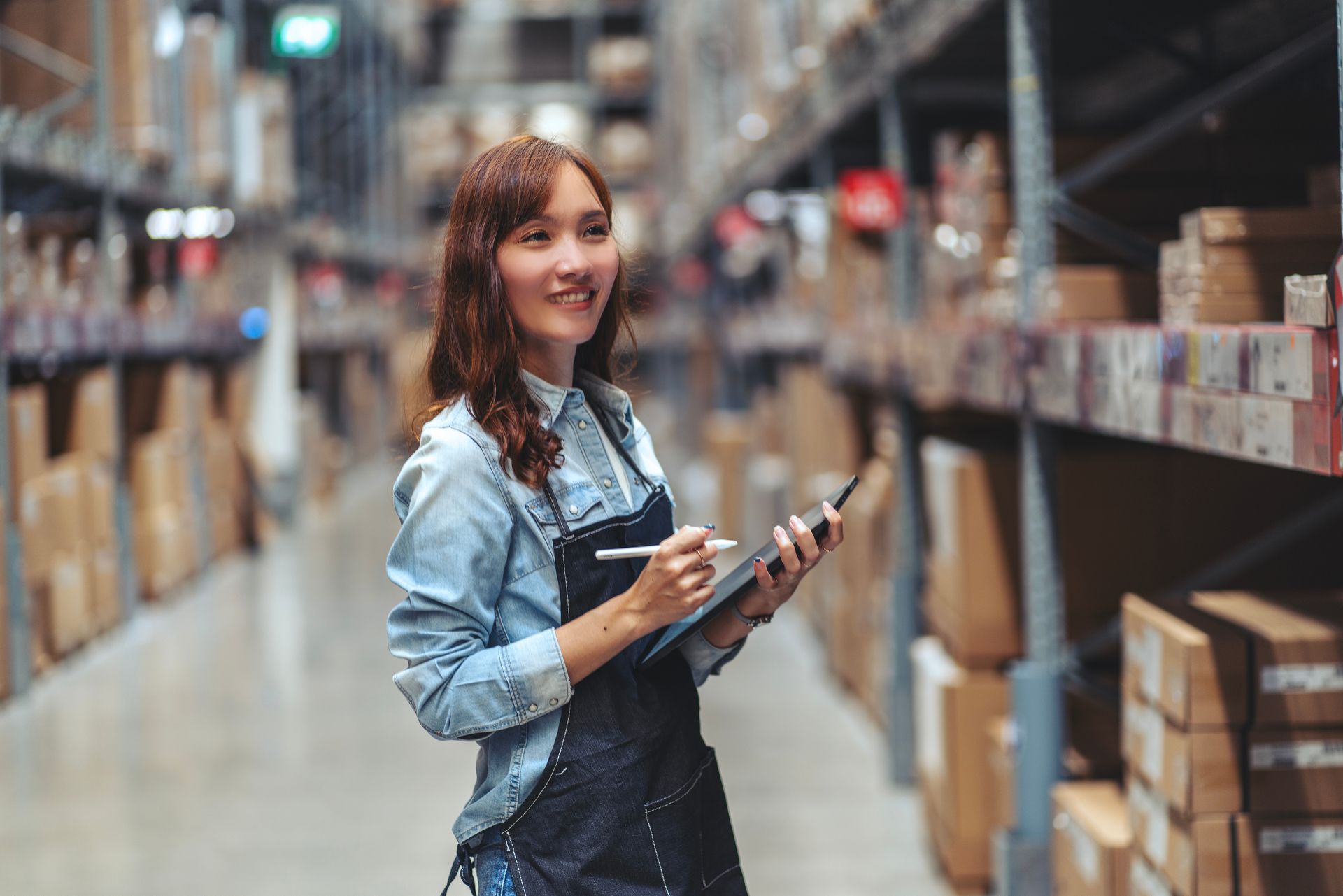 Woman walks with a tablet checks stock. Woman walks with a tablet checks stock.