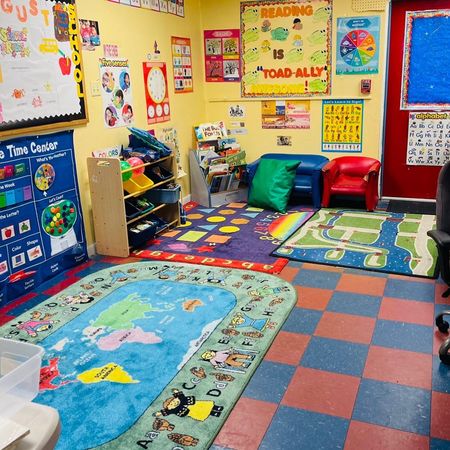 A classroom with a sign that says