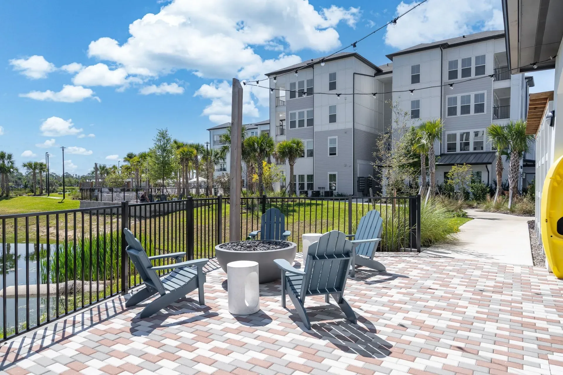 Outdoor seating area with fire pit and chairs
