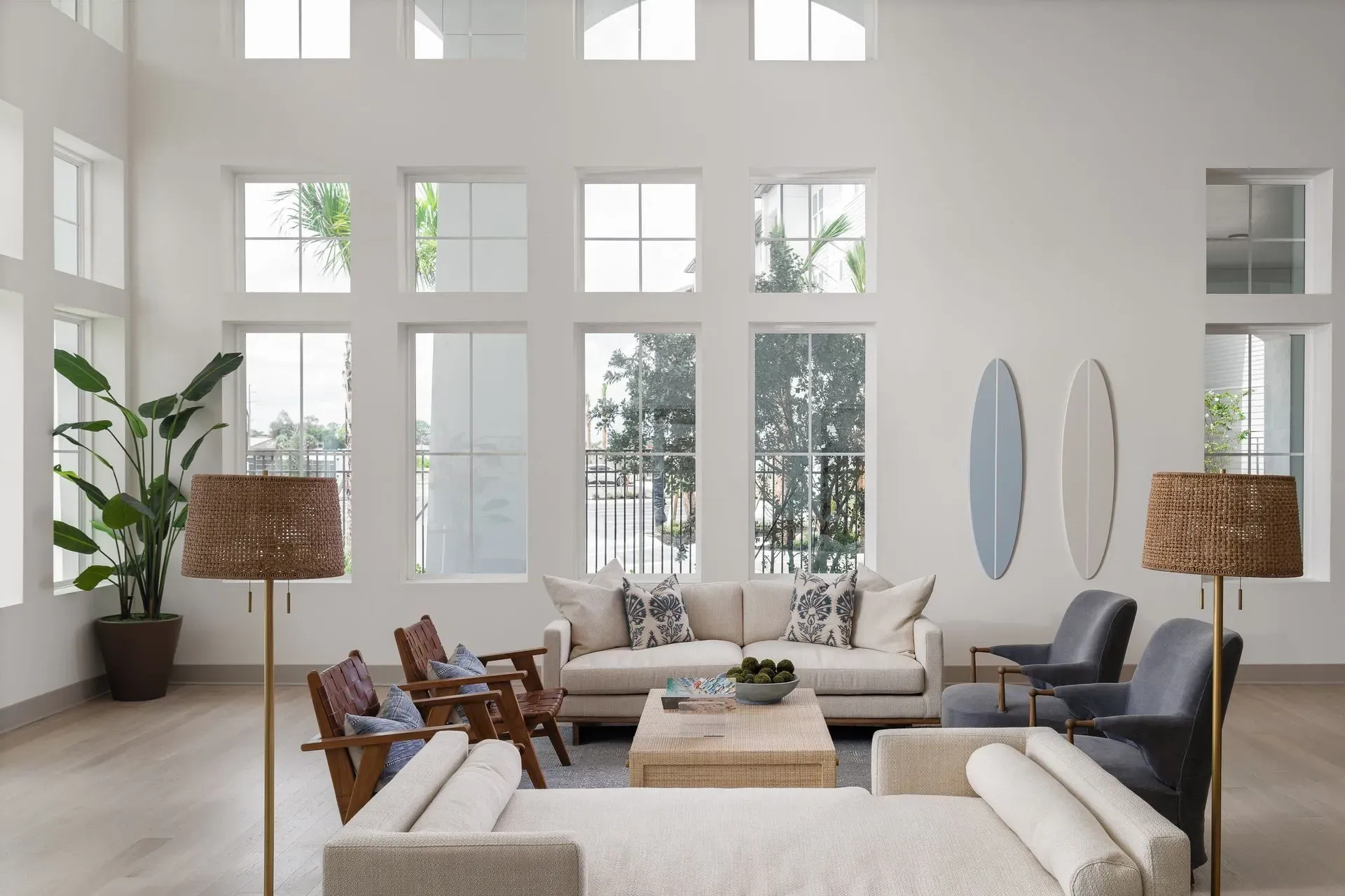 Spacious common area with comfortable seating and large windows.