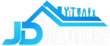 Blue and white “JT Yitahl Solutions” logo with a stylized roof over the text