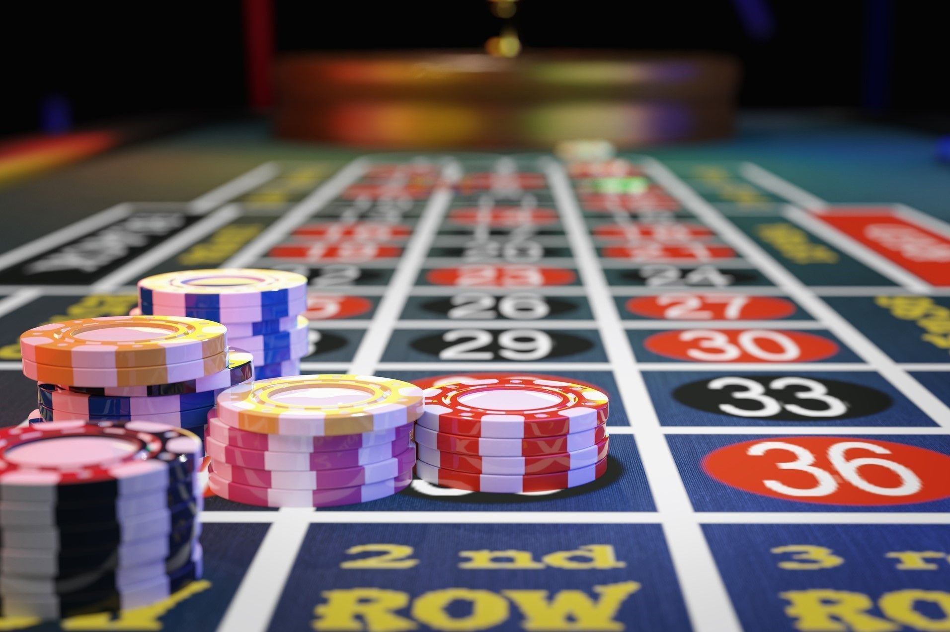 A close up of a roulette table with chips on it A close up of a roulette table with chips on it