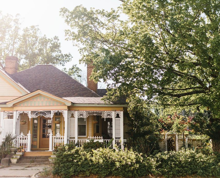 historic home with ornate porch