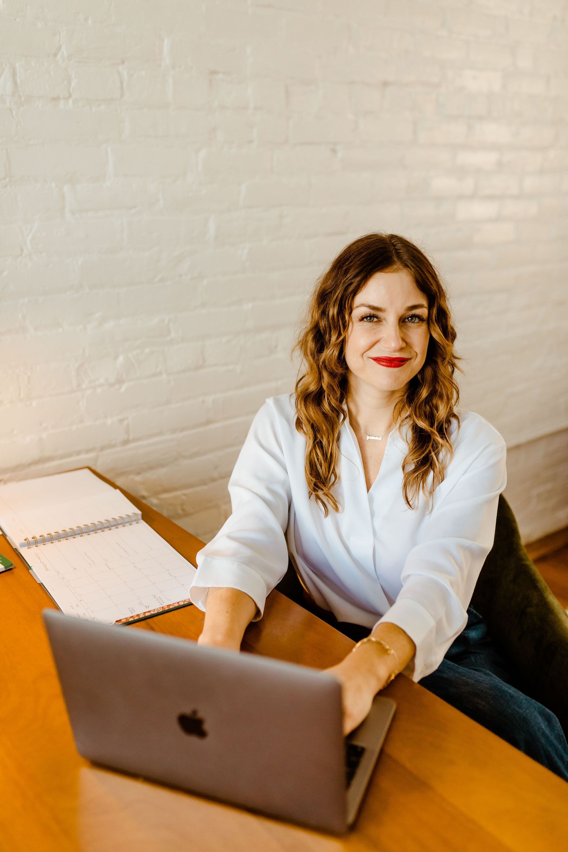 khristi dixon, realtor, sitting at desk