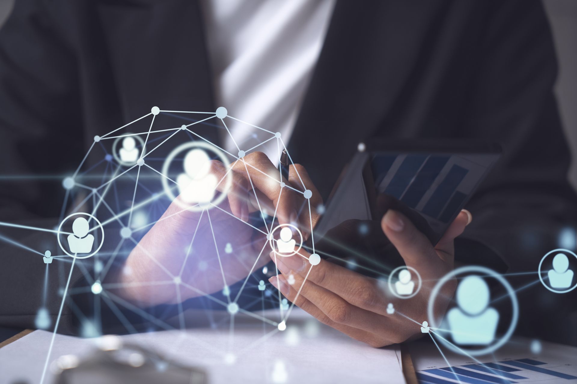 Businessperson using a smartphone with glowing network icons and connection lines overlayed
