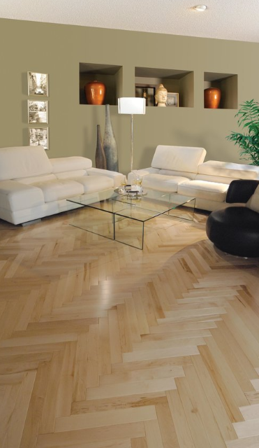 A living room with a couch , chair and coffee table