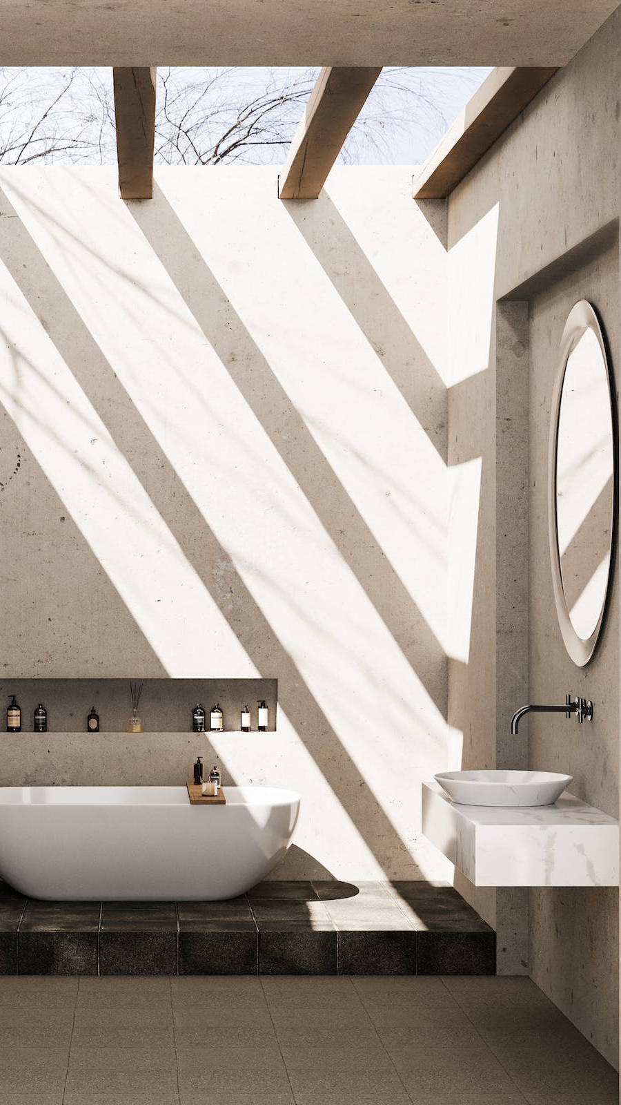 A bathroom with a bathtub , sink and mirror.