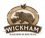 The logo for wickham planchers de bois franc has a bear on it.