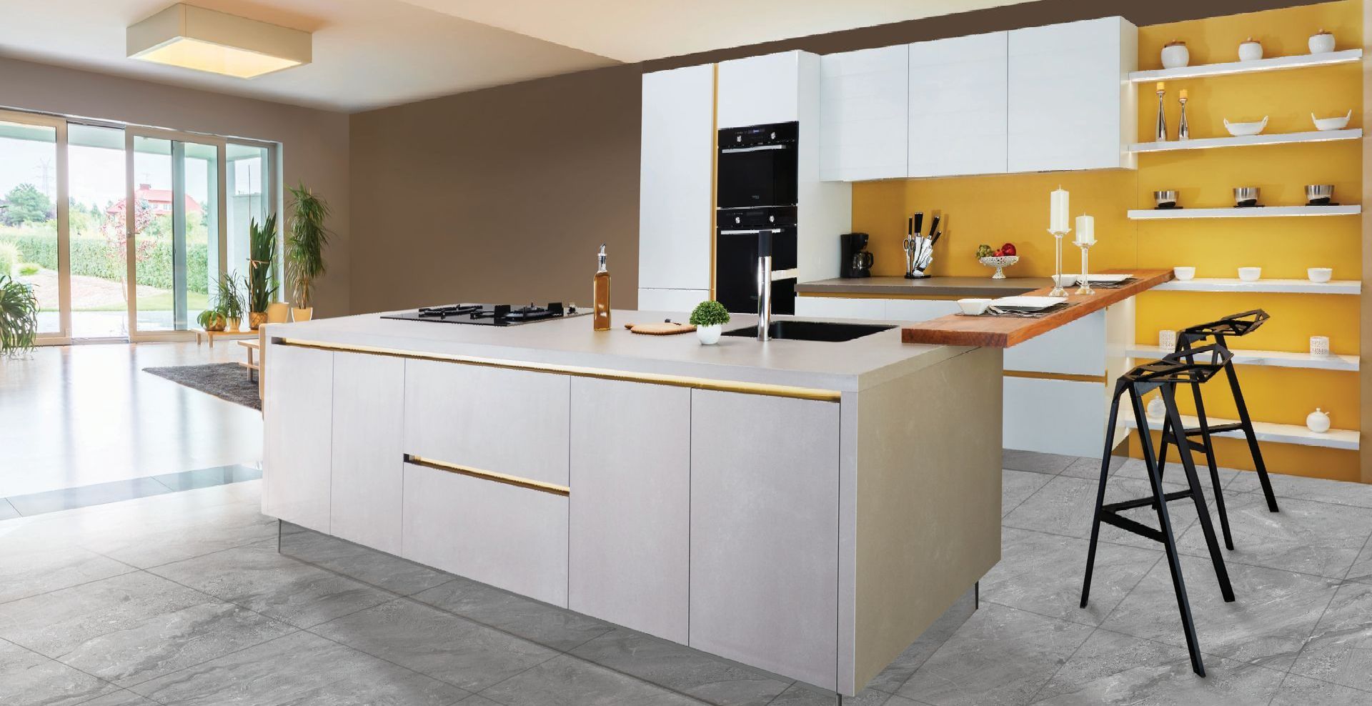 A kitchen with white cabinets and a large island in the middle.