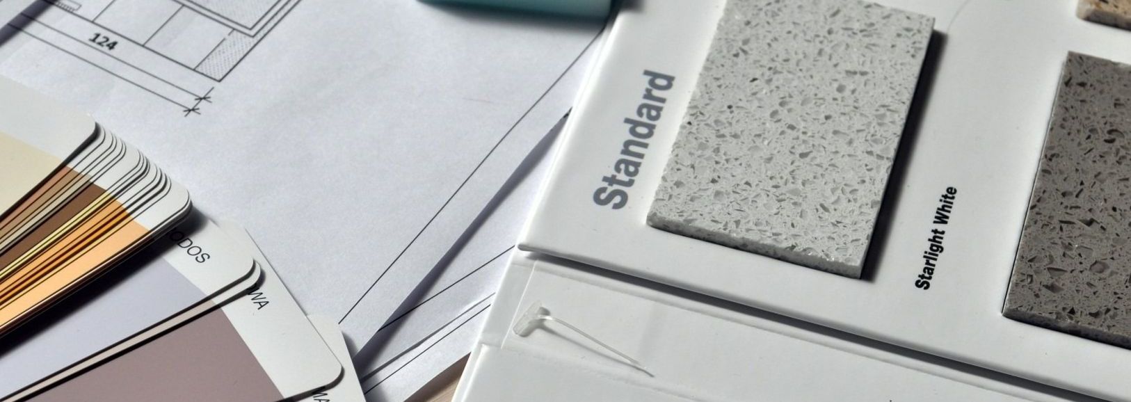 A bunch of samples of different types of materials are sitting on top of a table.
