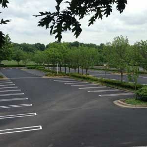Asphalt services in Kansas City MO commercial parking lot paving project by KCCAS Contractors