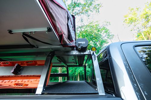 Easy shelving and storage solution in a bed rack.