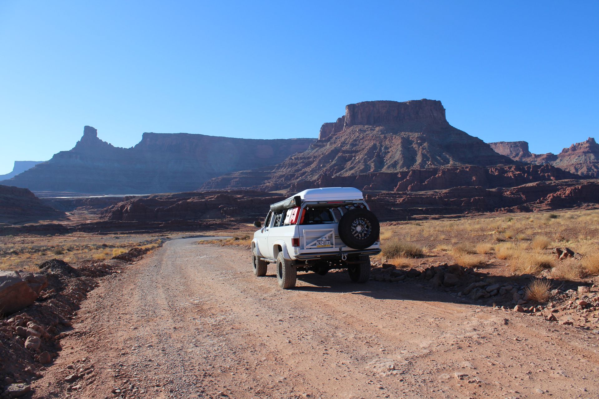 Overlanding vehicle navigating Moab’s tough offroad terrain with ease.