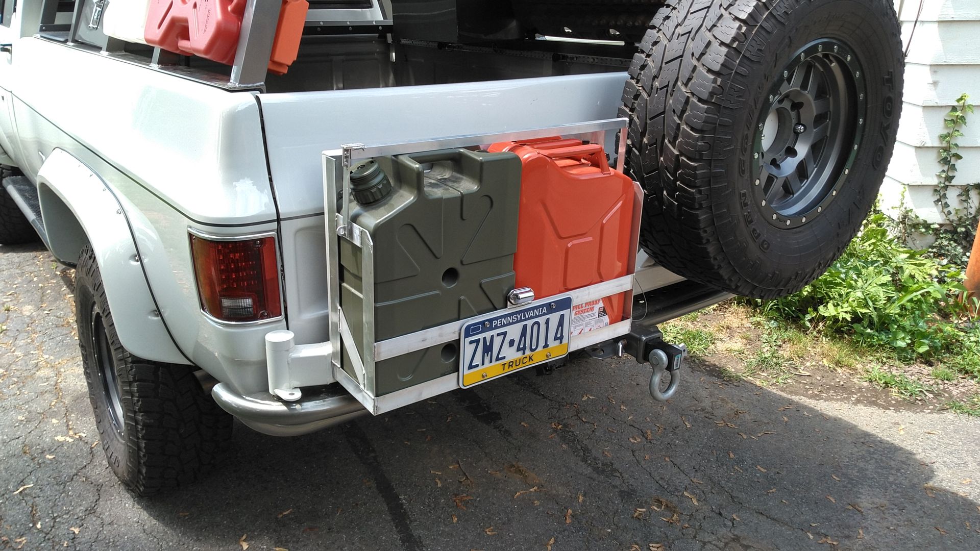 Durable, custom frame for secure storage of camping gear like Lifesaver jerrycan.