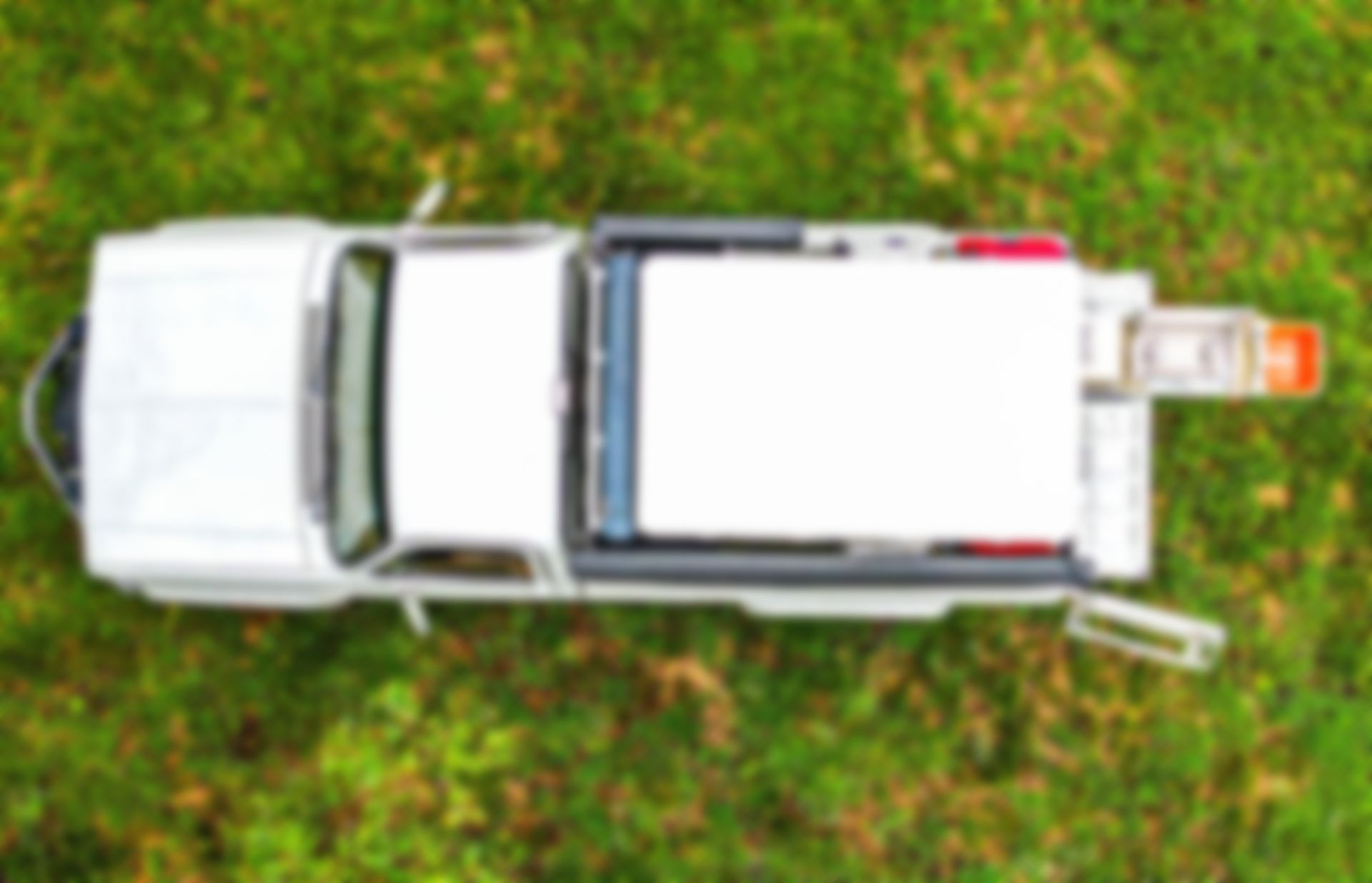 Truck equipped with a retractable kitchen, ready for camping and overlanding trips