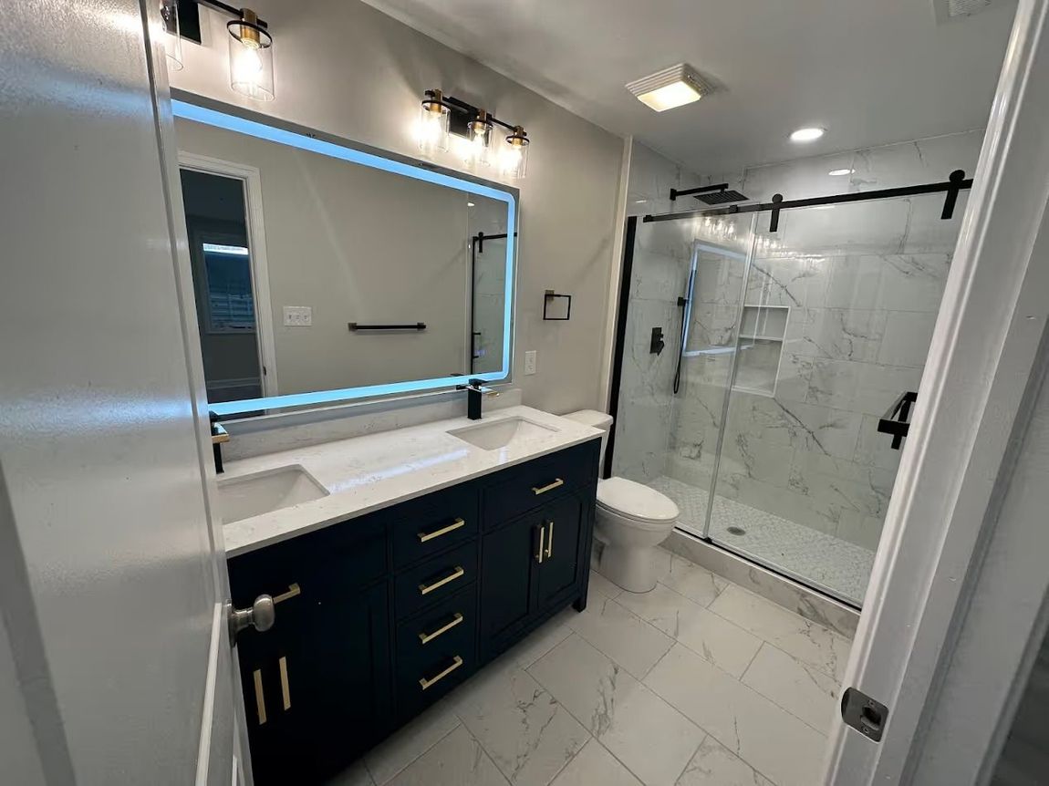 Stylish kitchen with built-in microwave in the island, dedicated coffee station, and upper wall cabinets with glass doors for a clean and functional 