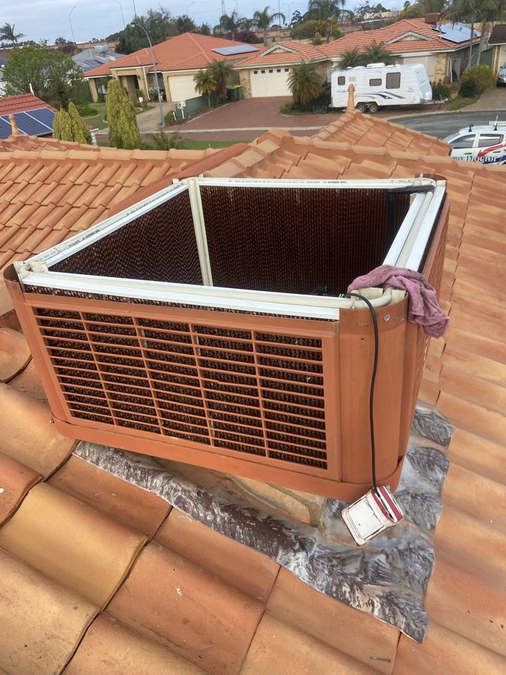 Man Checking the Aircon - Gosnells, WA - Evap Doctor