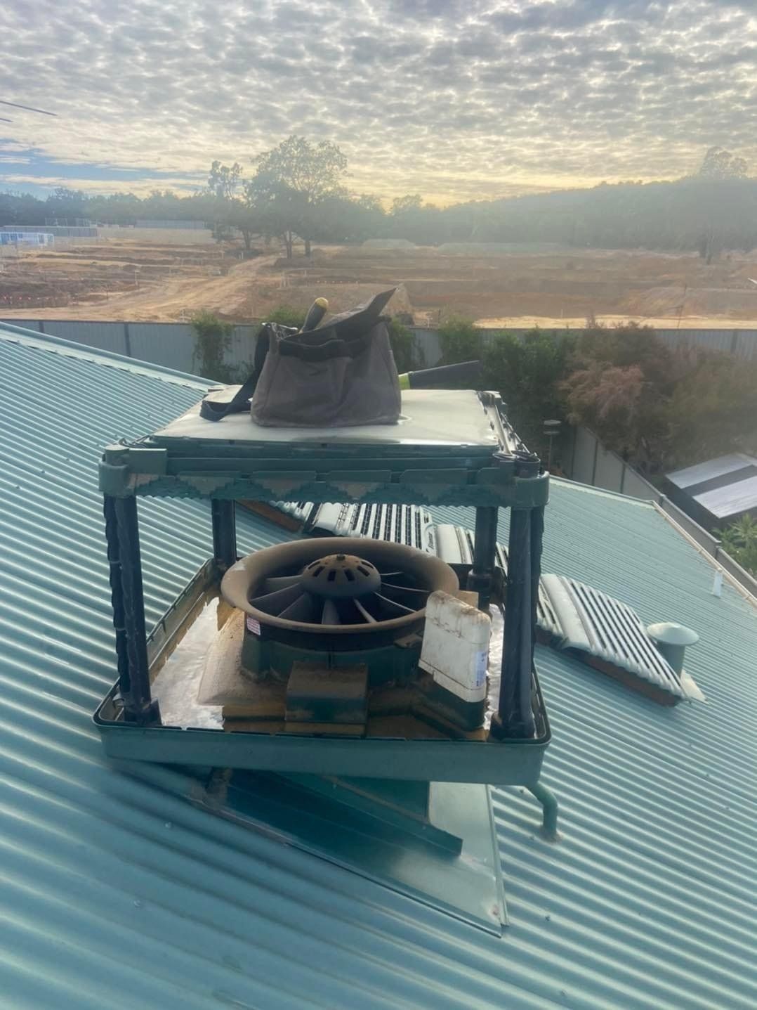Man Checking The Airconditioner - Gosnells, WA - Evap Doctor