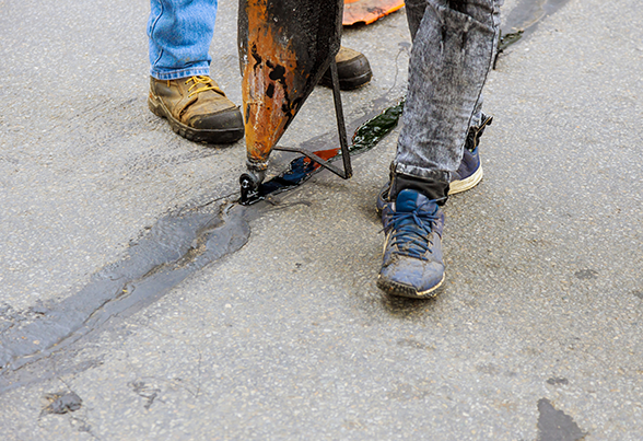Asphalt Crack Repair — Canton, OH — Milhoan Asphalt Maintenance Inc Asphalt Crack Repair — Canton, OH — Milhoan Asphalt Maintenance Inc