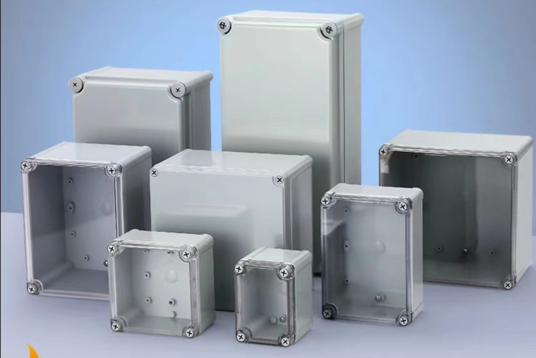 A group of plastic boxes are stacked on top of each other on a table.