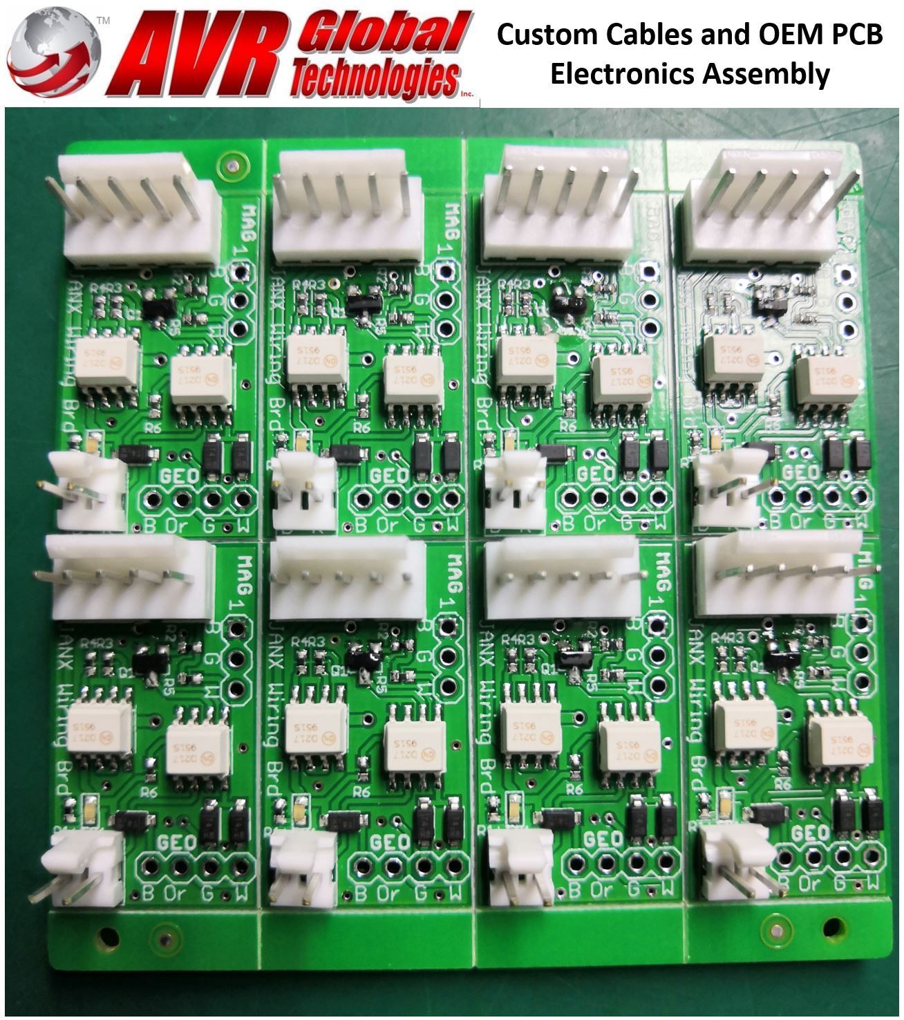 A green board with a lot of electronics on it