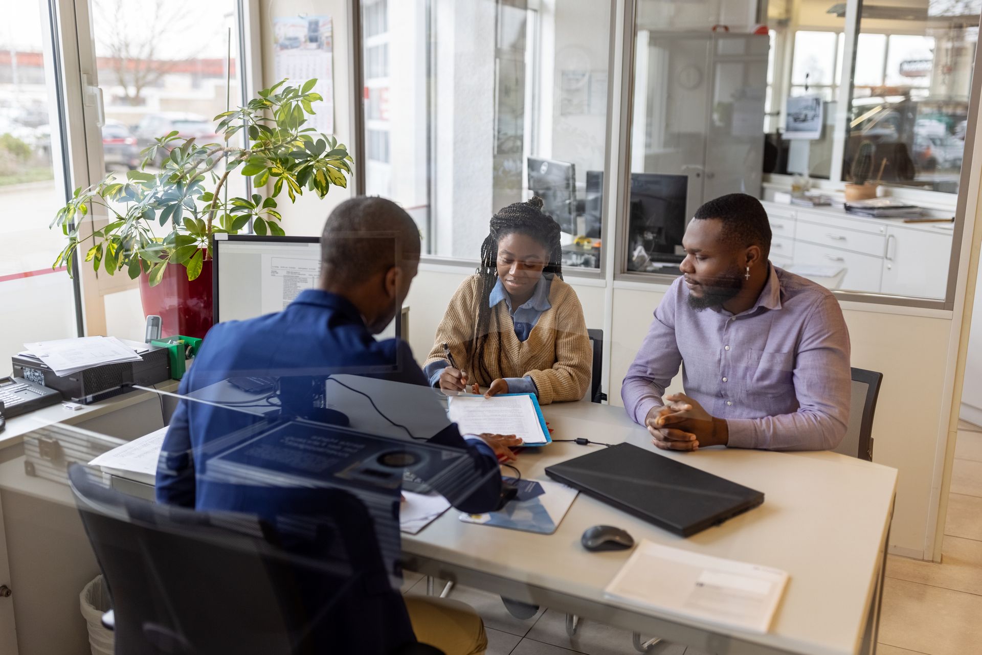 A couple is applying for a loan. A couple is applying for a loan.