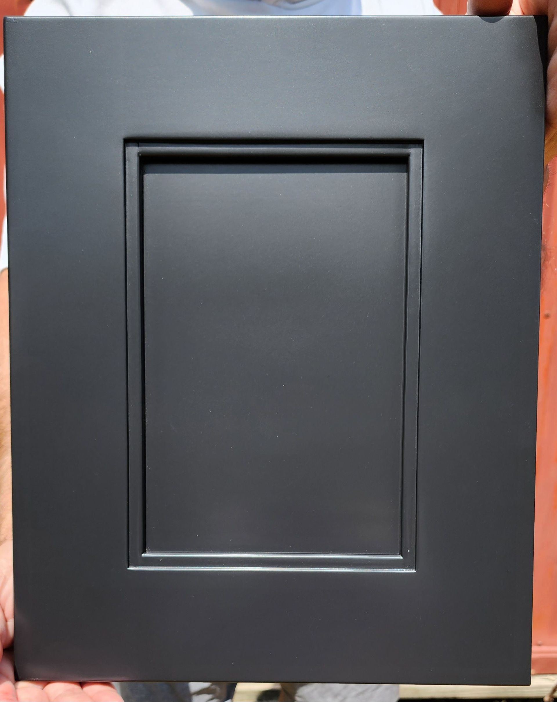 Black recessed panel cabinet door front with simple rectangular molding