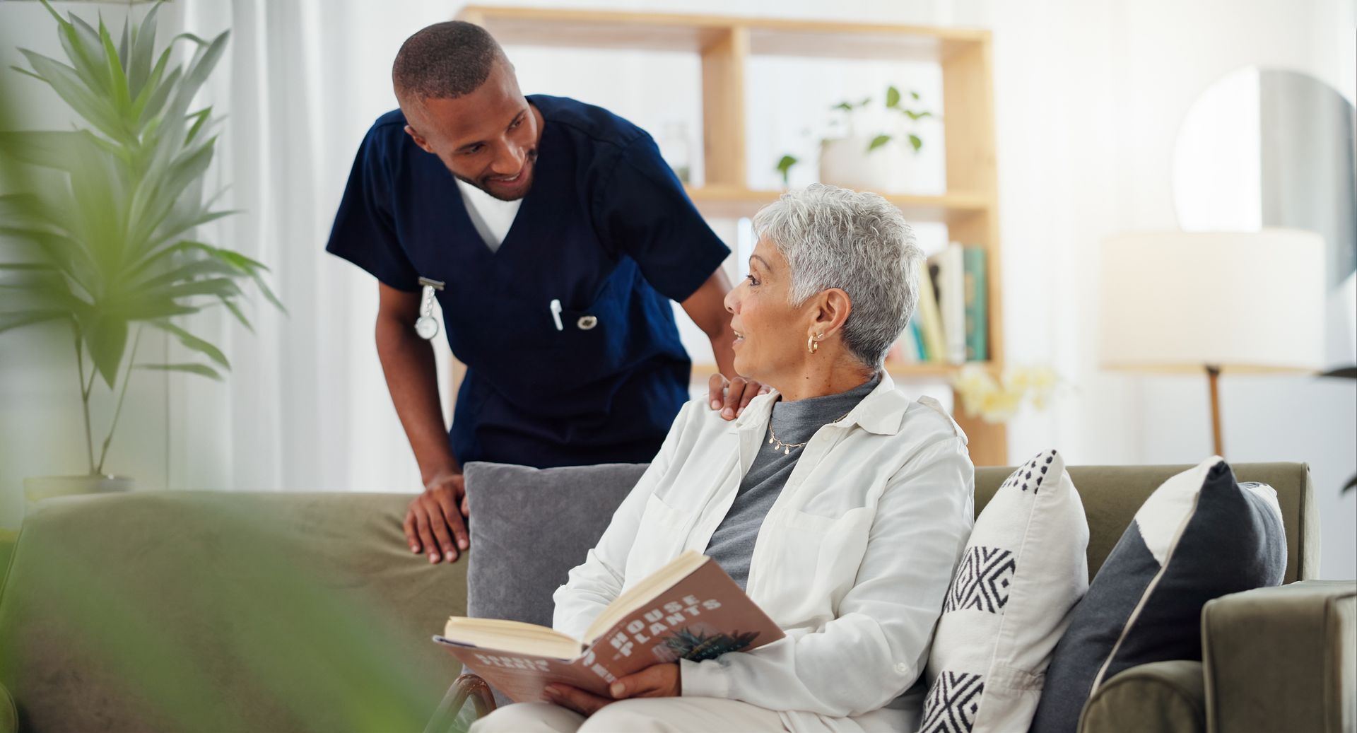 nurse checking on old black woman