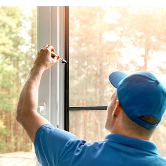man removing and fixing a screen