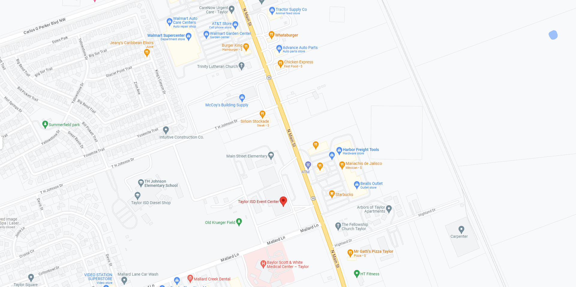 Blurred street map with a highlighted yellow road and multiple labeled locations on a white background