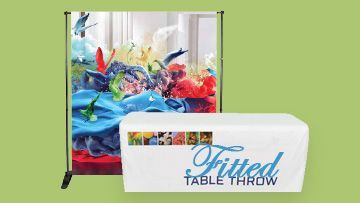 A table throw with a picture of flowers on it.