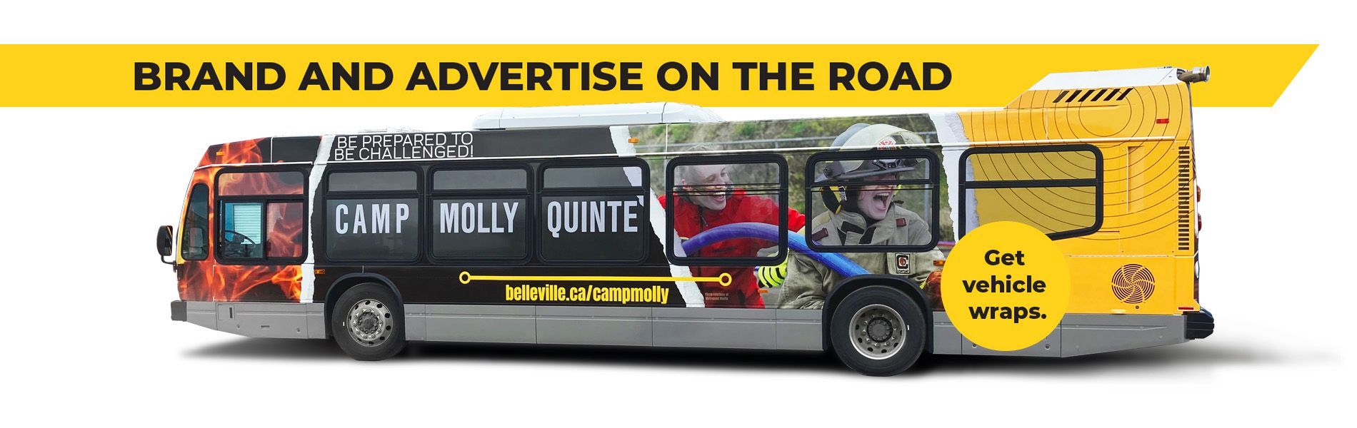 A bus with an advertisement on the side that says brand and advertise on the road