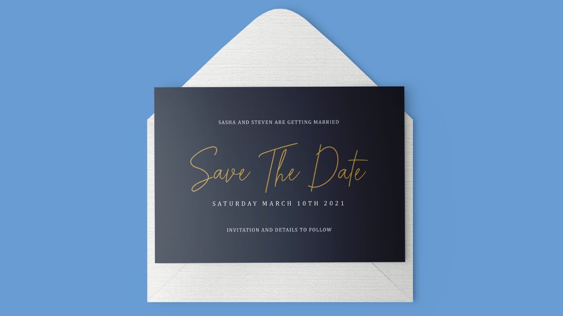 A black save the date card is in an envelope