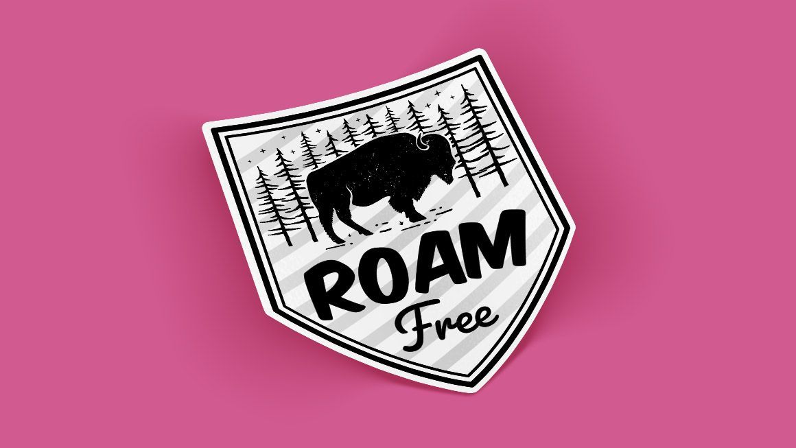 A sticker with a bison on it that says roam free
