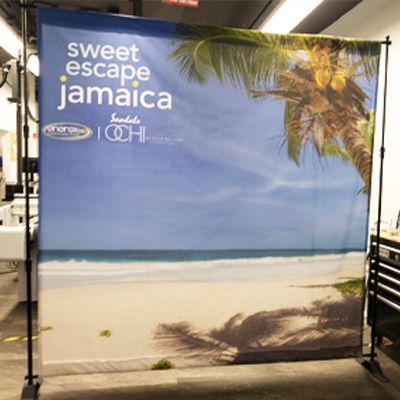 A banner that says sweet escape jamaica on it