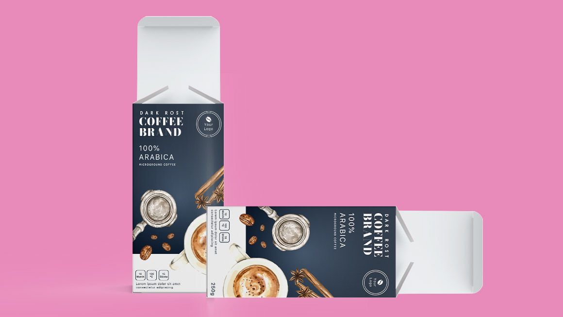Two boxes of coffee are sitting next to each other on a pink background.