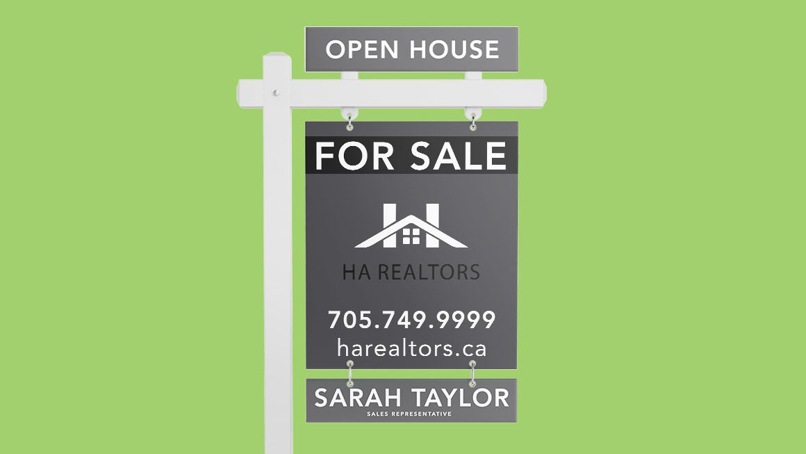 A for sale sign with a picture of a white house on it.