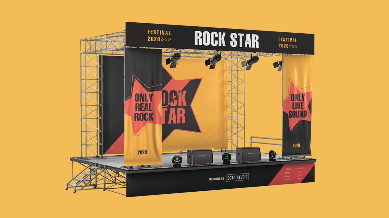a stage set up with printed banners, boards and backdrops