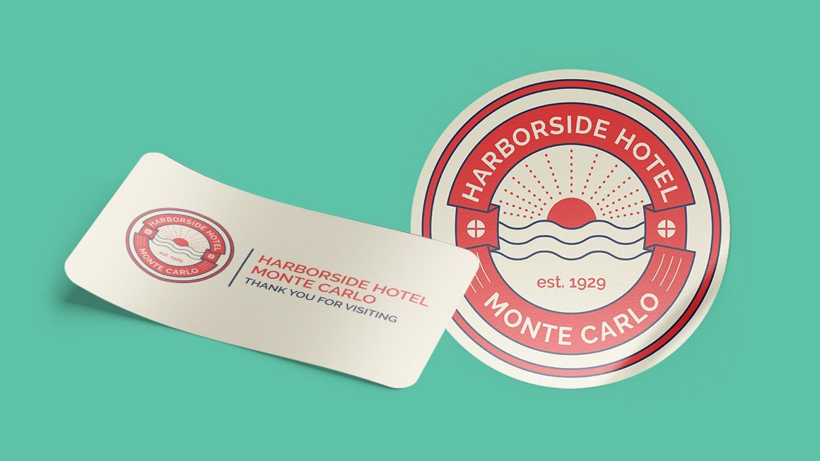 A business card and a sticker for harborside hotel monte carlo on a green background.