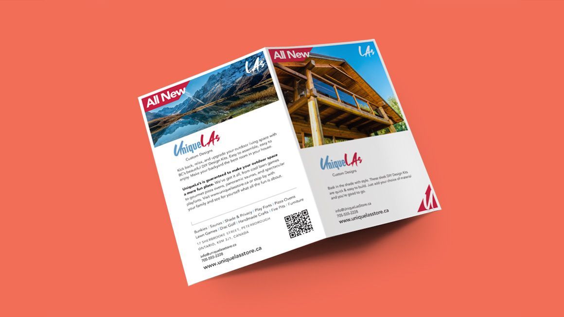 A folded brochure with a picture of a wooden structure on a red background.
