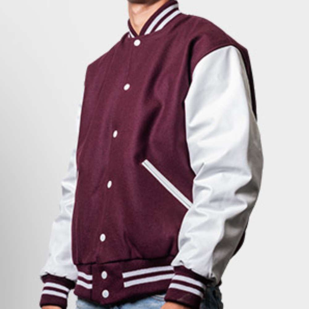 A man wearing a maroon and white varsity jacket