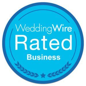 WeddingWire Rated Business badge: blue circle, white text.
