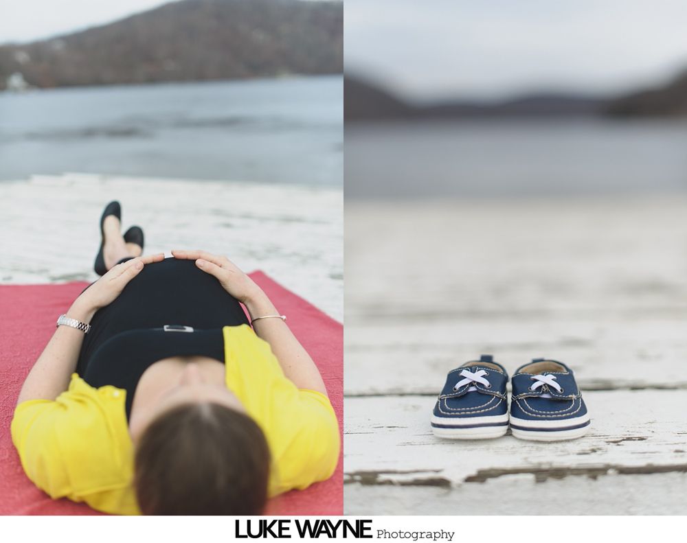 Pregnant person lying on red blanket; baby shoes on a dock.
