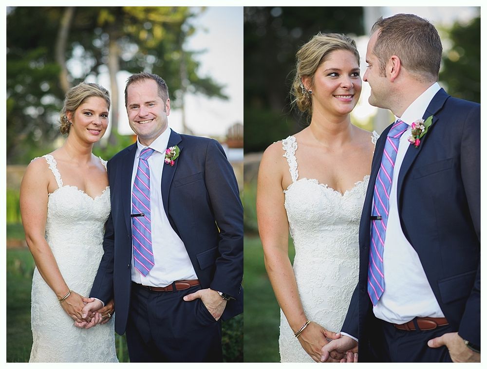 Bride with arms up, making a funny face, groom looking at his hand, cake cutting in background.