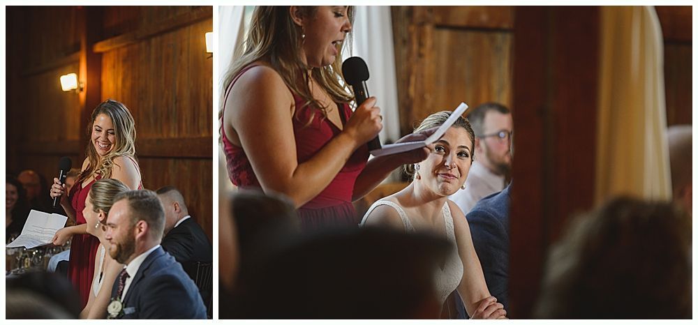 Woman in red dress giving a speech at a wedding. Bride smiles. Wooden interior.