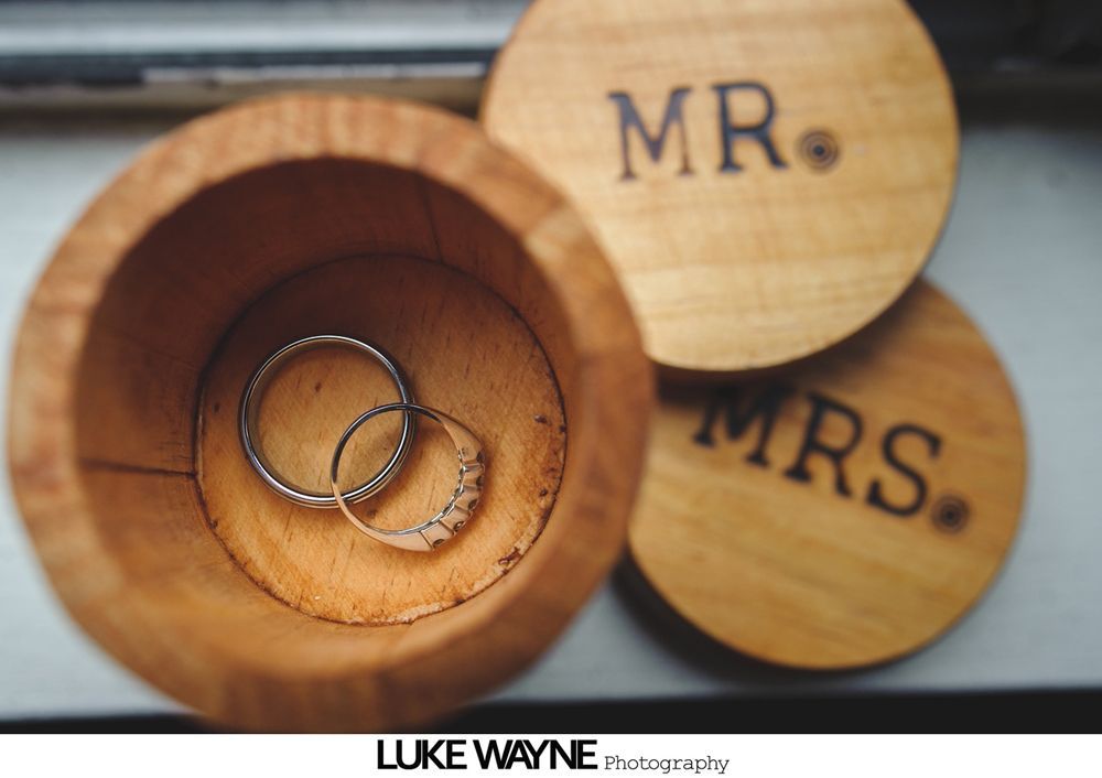 Wedding rings inside a wooden box, with 